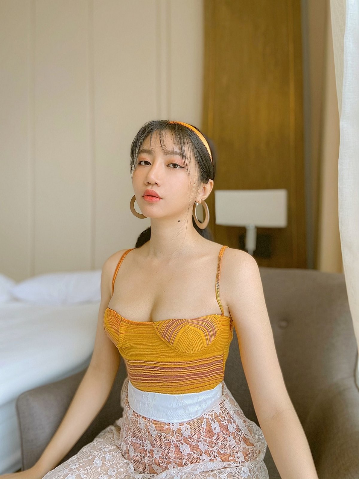 anh-ca-si-orange-bikini-sexy-goi-cam-10